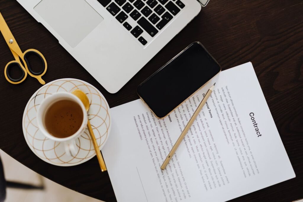 Purchase contract and notes on a desk, ready for review before an order