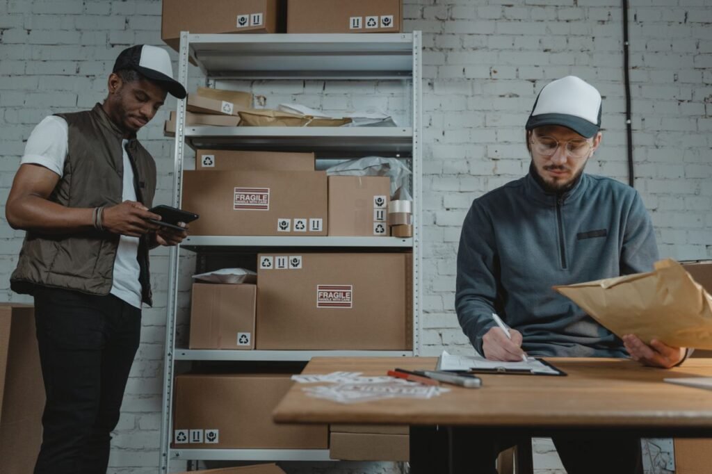 Warehouse team checking and organising cartons before a shipment