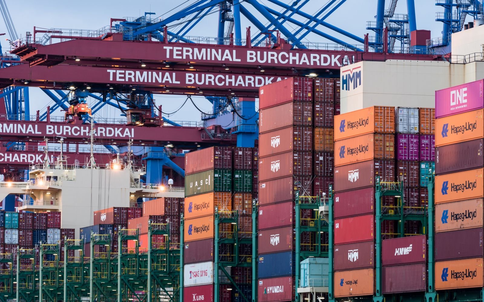 Port cranes and containers in a harbor