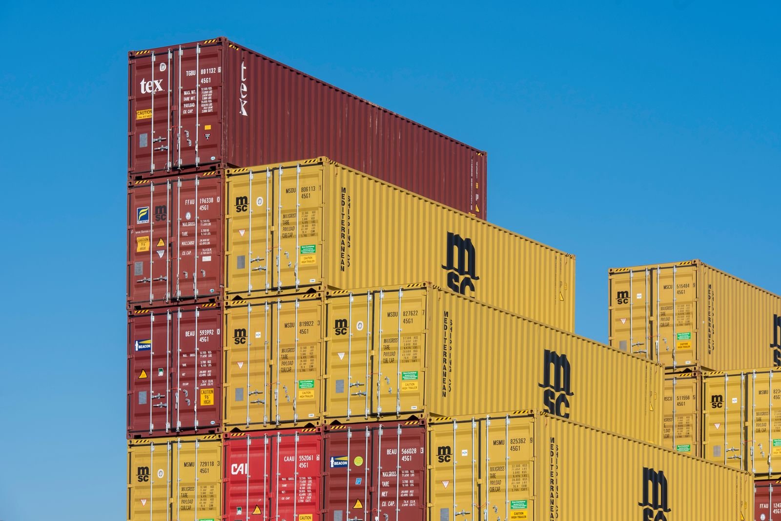 Stacked shipping containers for full container load shipments
