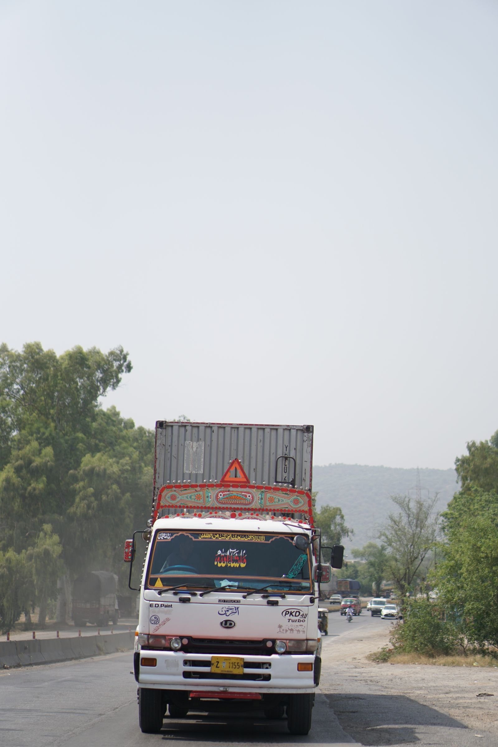 Decorated cargo truck on a highway in Pakistan
