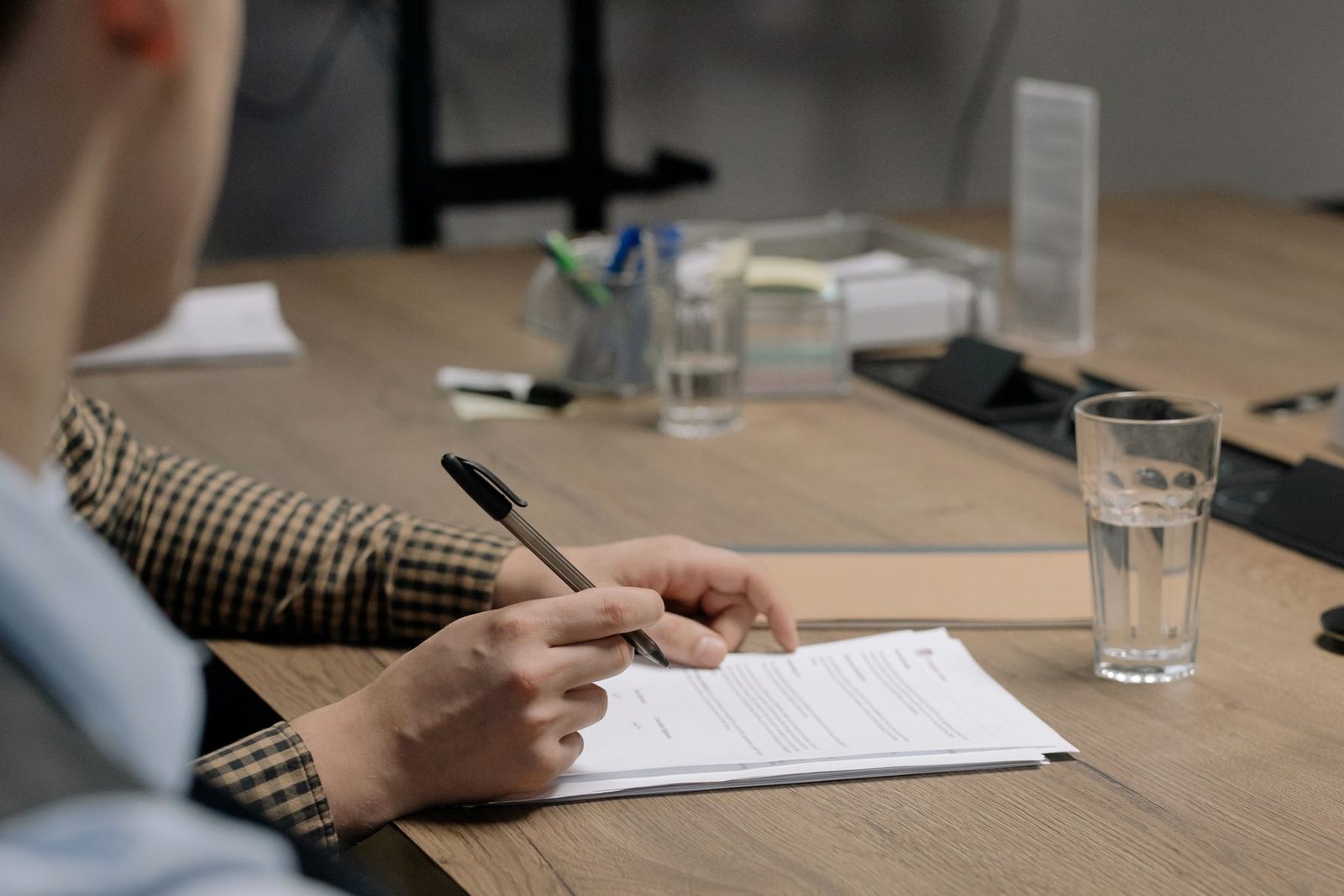 Person signing shipping and origin documents