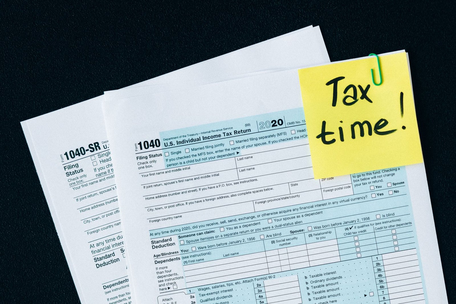 Tax documents on a table for calculating import duty and tax