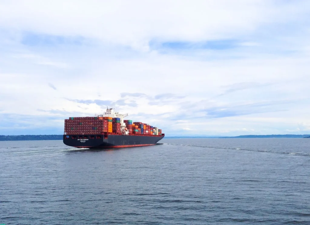 Container ship loaded with containers at sea